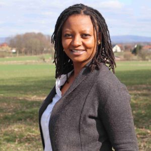 Das Bild kündigt eine Lesung mit Evelyne Waithira Müller im Kloster Wiedenbrück an.