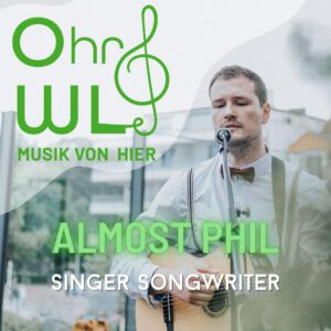 Eine Ankündigung, dass der Singer Songwriter Almost Phil im Rahmen der Musikreihe "OhrWL–Musik von hier" ein Konzert im Kloster Wiedenbrück gibt.